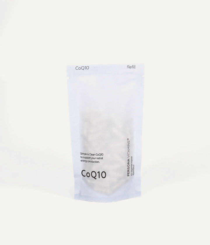 CoQ10 refill pouch standing on a cream background