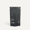 Sleep+ refill pouch standing on a cream background